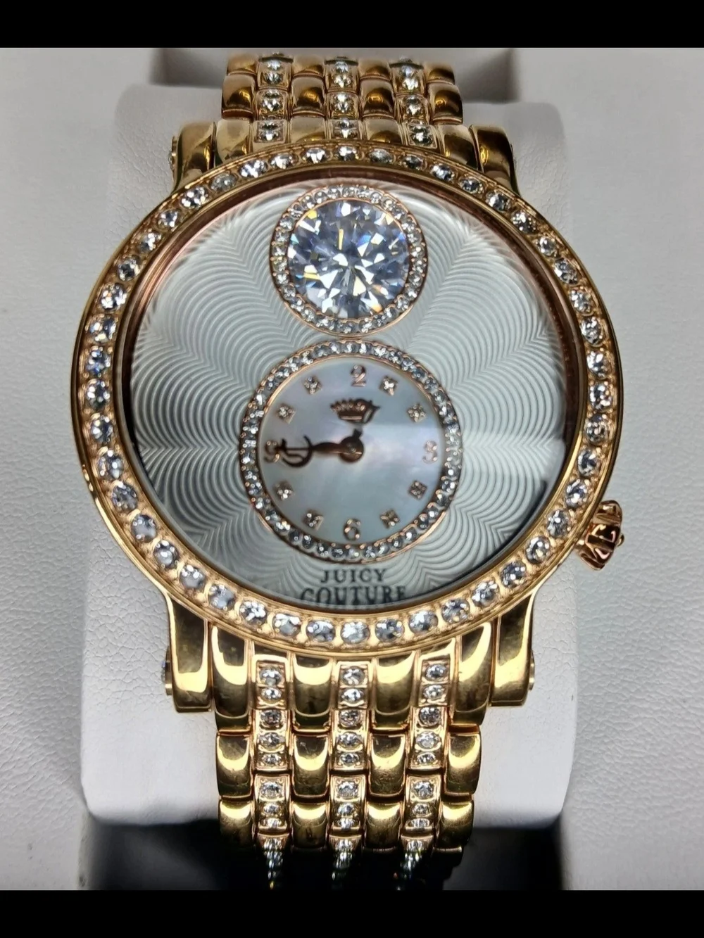 ​Juicy Couture Gold Tone Crystal Bezel Floating Solitaire Watch